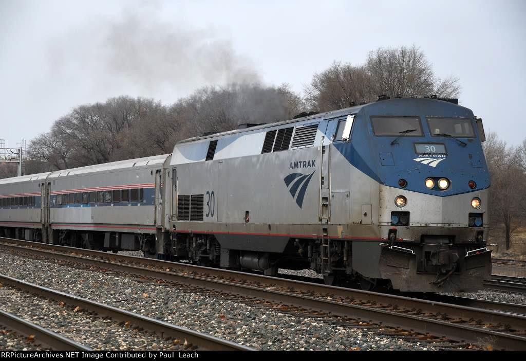 Eastbound "Borealis" throttles up just out of the station